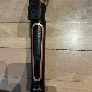 Gold and Black Curling Iron